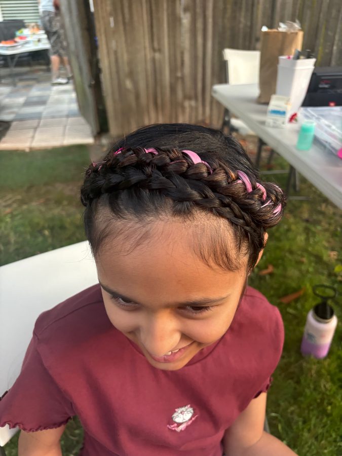 Smiling guest with braided headband