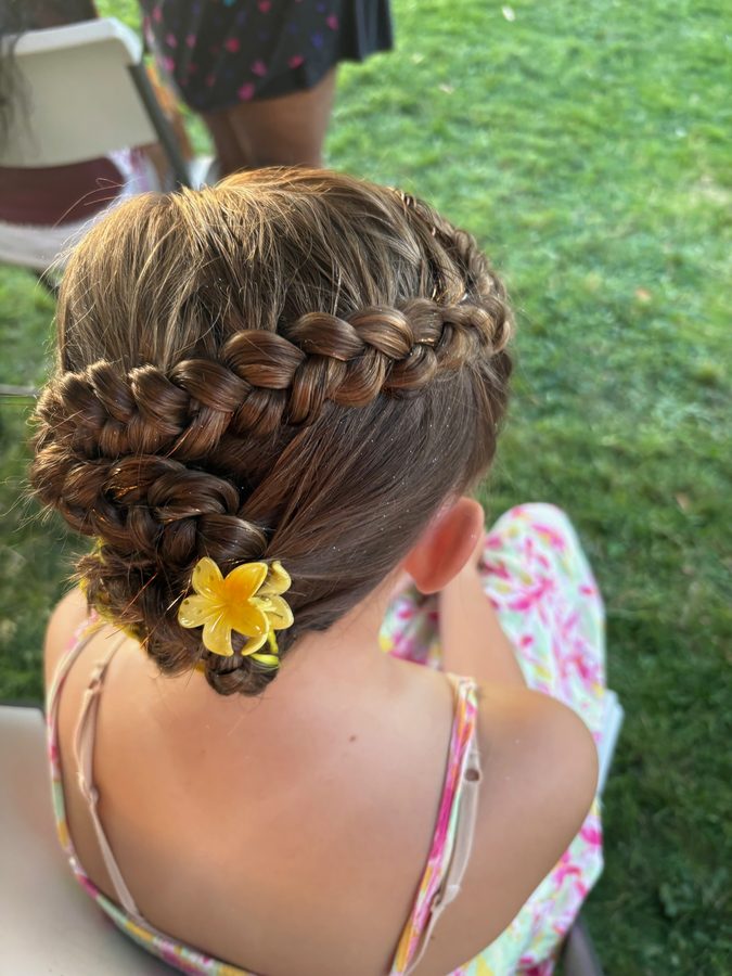 Braid with yellow flower accent