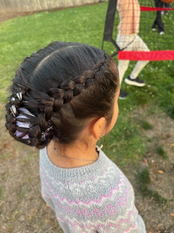 Braided updo with holographic ribbon